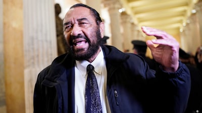 Democrat leader Al Green reacts after he is escorted out for yelling during US President Donald Trump's speech to a joint session of Congress. (REUTERS)