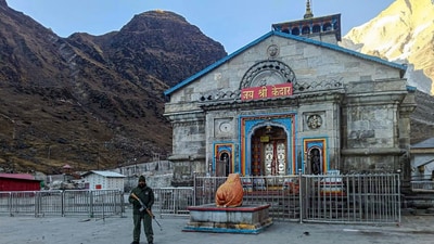Security personnel stand guard outside the Kedarnath Temple as it remains closed during the Winter season, in Rudraprayag on Saturday. ( (ANI Photo)) Security personnel stand guard outside the Kedarnath Temple as it remains closed during the Winter season, in Rudraprayag on Saturday. ( (ANI Photo))