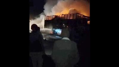 Truck caught flames at elevated road in Jagraon in Ludhiana on Wednesday. (HT PHOTO)