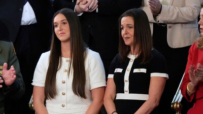 President Trump honoured the lives of Laken Riley and Jocelyn Nungaray. wo were killed by illegal immigrants under Biden's administration. In pic: Lauren Phillips, left, and Allyson Phillips, family members of the late Laken Riley, watch as President Donald Trump addresses a joint session of Congress at the Capitol in Washington, Tuesday, March 4, 2025. (AP) President Trump honoured the lives of Laken Riley and Jocelyn Nungaray. wo were killed by illegal immigrants under Biden's administration. In pic: Lauren Phillips, left, and Allyson Phillips, family members of the late Laken Riley, watch as President Donald Trump addresses a joint session of Congress at the Capitol in Washington, Tuesday, March 4, 2025. (AP)