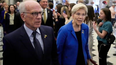 Sen. Elizabeth Warren, D-Mass., and Sen. Peter Welch, D-Vt., left, arrive before President Donald Trump addresses a joint session of Congress at the Capitol in Washington, Tuesday, March 4, 2025. (AP Photo/Ben Curtis) (AP) Sen. Elizabeth Warren, D-Mass., and Sen. Peter Welch, D-Vt., left, arrive before President Donald Trump addresses a joint session of Congress at the Capitol in Washington, Tuesday, March 4, 2025. (AP Photo/Ben Curtis) (AP)