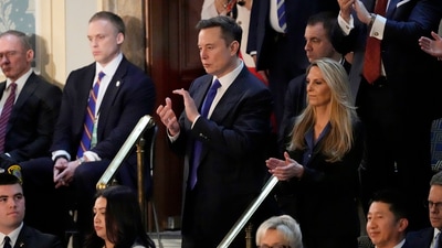 Elon Musk, center, applauds as President Donald Trump addresses a joint session of Congress at the Capitol in Washington, Tuesday, March 4, 2025. (AP Photo/Ben Curtis) (AP) Elon Musk, center, applauds as President Donald Trump addresses a joint session of Congress at the Capitol in Washington, Tuesday, March 4, 2025. (AP Photo/Ben Curtis) (AP)