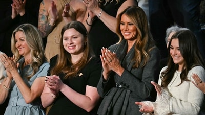 US First Lady Melania Trump (2nd R) stands as she is recognized by US President Donald Trump during Trump's address to a joint session of Congress in the House Chamber of the US Capitol in Washington, DC, on March 4, 2025. (Photo by Jim WATSON / AFP) (AFP) US First Lady Melania Trump (2nd R) stands as she is recognized by US President Donald Trump during Trump's address to a joint session of Congress in the House Chamber of the US Capitol in Washington, DC, on March 4, 2025. (Photo by Jim WATSON / AFP) (AFP)