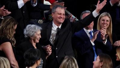 Marc Fogel, an American history teacher who was detained in Russia reacts during Donald Trump's speech as he makes a special mention about how he had promised last summer to bring Marc home and within 22 days of office fulfilled his promise.&nbsp; (REUTERS)