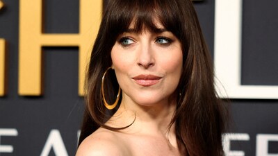 Dakota Johnson arrives for the Saturday Night Live 50. (REUTERS)