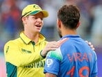 Virat Kohli with Australia's captain Steve Smith after India's win in the ICC Champions Trophy 2025 semi-final match in Dubai

