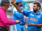 India's Mohammed Shami with Umpire Richard Illingworth India's Mohammed Shami with Umpire Richard Illingworth