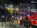 Emergency personnel work in a destroyed building following a Russian missile strike, amid Russia's attack on Ukraine, in Kryvyi Rih, Ukraine March 5, 2025. 