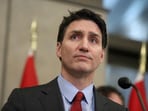 Canada's Prime Minister Justin Trudeau looks on during a press conference.