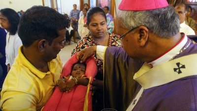 Chennai, Mar 05 (ANI): An archbishop applies sacred ash on a baby's forehead on the first day of Lent, at St Thomas Cathedral Basilica in Chennai on Wednesday. (ANI Photo) (Lakshmi) Chennai, Mar 05 (ANI): An archbishop applies sacred ash on a baby's forehead on the first day of Lent, at St Thomas Cathedral Basilica in Chennai on Wednesday. (ANI Photo) (Lakshmi)