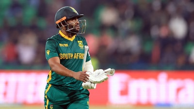 Cricket - ICC Men's Champions Trophy - Semi Final - South Africa v New Zealand - Gaddafi Stadium, Lahore, Pakistan - March 5, 2025 South Africa's Temba Bavuma walks back to the pavilion after losing his wicket, caught out by New Zealand's Kane Williamson off the bowling of Mitchell Santner REUTERS/Akhtar Soomro (REUTERS)
