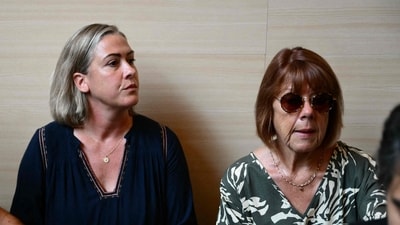 Gisele Pelicot (R) sits beside her daughter Caroline Darian at the courthouse during the trial of her husband in Avignon. (AFP)