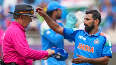 India's Mohammed Shami with Umpire Richard Illingworth (PTI) India's Mohammed Shami with Umpire Richard Illingworth (PTI)