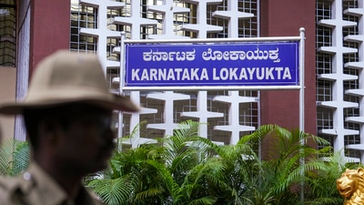 Lokayukta sources said they unearthed cash, jewels, lavish houses, high end vehicles and incriminating documents pertaining to their investments in real estate and various bonds (PTI) Lokayukta sources said they unearthed cash, jewels, lavish houses, high end vehicles and incriminating documents pertaining to their investments in real estate and various bonds (PTI)