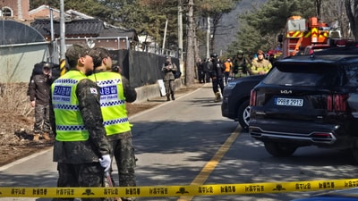 South Korean soldiers stand guard near a bomb accident site outside a military live-fire training range in Pocheon on March 6, 2025. The incident has reportedly injured at least eight people. (AFP) South Korean soldiers stand guard near a bomb accident site outside a military live-fire training range in Pocheon on March 6, 2025. The incident has reportedly injured at least eight people. (AFP)