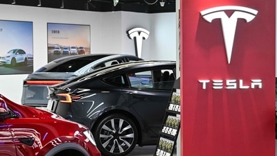 Elon Musk's automotive company, Tesla, has taken 4,000 sq ft of showroom space in India's costliest commercial district in Mumbai. (Representative photo) (AFP) Elon Musk's automotive company, Tesla, has taken 4,000 sq ft of showroom space in India's costliest commercial district in Mumbai. (Representative photo) (AFP)