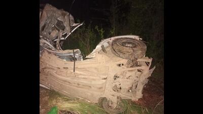 The mangled remains of the car after it rammed into a tree near Mangali village in Hisar district on Wednesday night. (HT Photo)