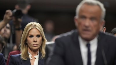 Cheryl Hines, wife of Robert F. Kennedy Jr., President Donald Trump's choice to be Secretary of Health and Human Services, watches as he appears before the Senate Finance Committee for his confirmation hearing, at the Capitol in Washington, Wednesday, Jan. 29, 2025. (AP Photo/Ben Curtis) (AP) Cheryl Hines, wife of Robert F. Kennedy Jr., President Donald Trump's choice to be Secretary of Health and Human Services, watches as he appears before the Senate Finance Committee for his confirmation hearing, at the Capitol in Washington, Wednesday, Jan. 29, 2025. (AP Photo/Ben Curtis) (AP)
