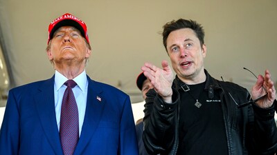 FILE - President-elect Donald Trump listens to Elon Musk as he arrives to watch SpaceX's mega rocket Starship lift off for a test flight from Starbase in Boca Chica, Texas, Nov. 19, 2024. (Brandon Bell/Pool via AP, File) (AP)