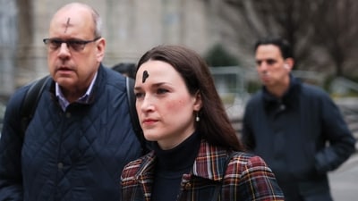 NEW YORK, NEW YORK - MARCH 05: People walk the streets after receiving ashes on the forehead on Ash Wednesday on March 05, 2025 in New York City. Ash Wednesday is the start of Lent, Christianity's 40-day season of prayer, fasting and giving in preparation to honor the resurrection of Jesus Christ on Easter Sunday. The cross which is placed on a worshiper's forehead by a priest indicates that a person belongs to Jesus Christ and is grieving and mourning for their sins. Michael M. Santiago/Getty Images/AFP (Photo by Michael M. Santiago / GETTY IMAGES NORTH AMERICA / Getty Images via AFP) (Getty Images via AFP) NEW YORK, NEW YORK - MARCH 05: People walk the streets after receiving ashes on the forehead on Ash Wednesday on March 05, 2025 in New York City. Ash Wednesday is the start of Lent, Christianity's 40-day season of prayer, fasting and giving in preparation to honor the resurrection of Jesus Christ on Easter Sunday. The cross which is placed on a worshiper's forehead by a priest indicates that a person belongs to Jesus Christ and is grieving and mourning for their sins. Michael M. Santiago/Getty Images/AFP (Photo by Michael M. Santiago / GETTY IMAGES NORTH AMERICA / Getty Images via AFP) (Getty Images via AFP)