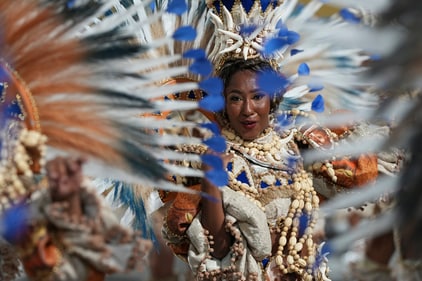 A performer from the Portela samba school parades during Carnival celebrations at the Sambadrome in Rio de Janeiro, Wednesday, March 5, 2025. (AP Photo/Silvia Izquierdo) (AP) A performer from the Portela samba school parades during Carnival celebrations at the Sambadrome in Rio de Janeiro, Wednesday, March 5, 2025. (AP Photo/Silvia Izquierdo) (AP)