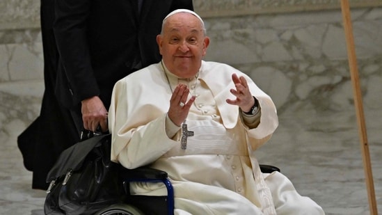 Pope Francis gestures as he arrives for a weekly general audience at Paul-VI hall in the Vatican on January 22, 2025. (AFP file)