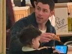 Priyanka Chopra, Nick Jonas and their daughter Malti at a New York restaurant. Priyanka Chopra, Nick Jonas and their daughter Malti at a New York restaurant.