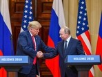 A file photo of US President Donald Trump and Russia's President Vladimir Putin shaking hands before attending a joint press conference at Helsinki. A file photo of US President Donald Trump and Russia's President Vladimir Putin shaking hands before attending a joint press conference at Helsinki.