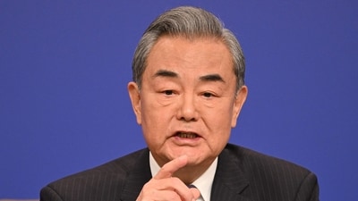 China's Foreign Minister Wang Yi speaks at a press conference during the ongoing National People's Congress (NPC) in Beijing on March 7, 2025. (AFP) China's Foreign Minister Wang Yi speaks at a press conference during the ongoing National People's Congress (NPC) in Beijing on March 7, 2025. (AFP)
