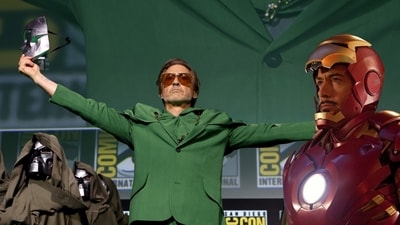 Robert Downey Jr. comes out as Dr. Doom and as Iron Man(right)