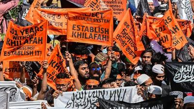 Members of banned Islamist group Hizb ut-Tahrir take part in a rally 'March For Khilafah' after their Friday prayers outside the National Mosque Baitul Mukarram in Dhaka on March 7. (AFP) Members of banned Islamist group Hizb ut-Tahrir take part in a rally 'March For Khilafah' after their Friday prayers outside the National Mosque Baitul Mukarram in Dhaka on March 7. (AFP)