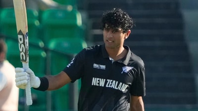 New Zealand's Rachin Ravindra celebrates after scoring a century during the ICC Champions Trophy semifinal cricket match between New Zealand and South Africa at Gaddafi Stadium in Lahore, Pakistan, Wednesday, March 5, 2025. (AP Photo/K.M Chaudary) (AP) New Zealand's Rachin Ravindra celebrates after scoring a century during the ICC Champions Trophy semifinal cricket match between New Zealand and South Africa at Gaddafi Stadium in Lahore, Pakistan, Wednesday, March 5, 2025. (AP Photo/K.M Chaudary) (AP)