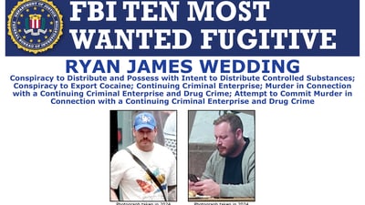 This undated handout made available by the FBI shows a poster with one of the FBI ten most wanted fugitives, Ryan James Wedding. (FBI via AP) (AP)