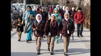Students heading towards their schools in Srinagar on Friday. (ANI) Students heading towards their schools in Srinagar on Friday. (ANI)