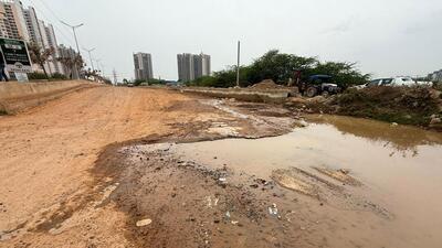The GMDA road connecting Sector 102/102A stretch with Dwarka Expressway has broken stretches and potholes, near Joyville appartment in Gurugram on Friday. (Parveen Kumar/HT Photo) The GMDA road connecting Sector 102/102A stretch with Dwarka Expressway has broken stretches and potholes, near Joyville appartment in Gurugram on Friday. (Parveen Kumar/HT Photo)
