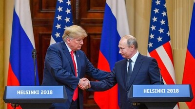A file photo of US President Donald Trump and Russia's President Vladimir Putin shaking hands before attending a joint press conference at Helsinki. (AFP File Photo) A file photo of US President Donald Trump and Russia's President Vladimir Putin shaking hands before attending a joint press conference at Helsinki. (AFP File Photo)