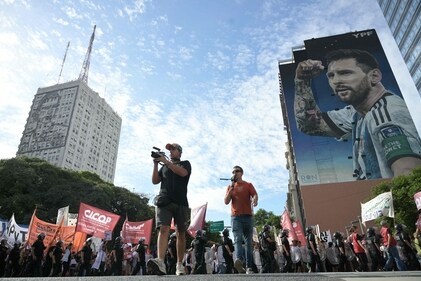 A protest in Buenos Aires against president Javier Milei's government in front of a Lionel Messi mural. (Juan Mabromata/AFP) A protest in Buenos Aires against president Javier Milei's government in front of a Lionel Messi mural. (Juan Mabromata/AFP)