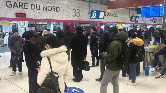 Passengers wait as Eurostar trains to London and all trains heading to northern France have been brought to a halt following the discovery of an unexploded bomb dating back to World War II. (AP)