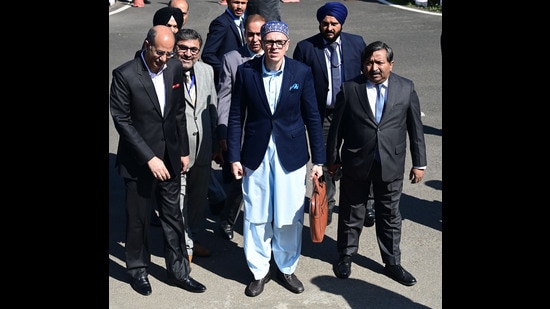Jammu and Kashmir chief minister Omar Abdullah arrives in the assembly for presenting budget on Friday. (HT photo)