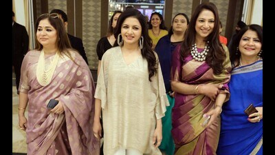 Bollywood actress Bhagyashre with FICCI Flow members during Women’s Day event in Ludhiana on Saturday. (Gurpreet Singh/HT)