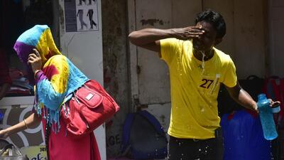 Mumbai, India - April 28, 2022: A youth washes his face for little respite in the sweltering heat as mercury rises, in Mumbai, India, on Thursday, April 28, 2022. (Photo by Anshuman Poyrekar/Hindustan Times) (Anshuman Poyrekar/HT Photo) Mumbai, India - April 28, 2022: A youth washes his face for little respite in the sweltering heat as mercury rises, in Mumbai, India, on Thursday, April 28, 2022. (Photo by Anshuman Poyrekar/Hindustan Times) (Anshuman Poyrekar/HT Photo)