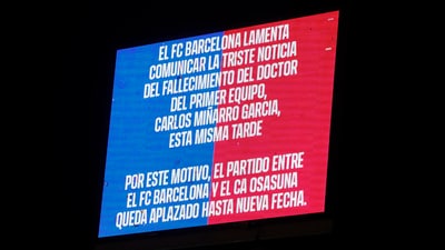Soccer Football - LaLiga - FC Barcelona v Osasuna - Estadi Olimpic Lluis Companys, Barcelona, Spain - March 8, 2025 A message is displayed on the screen advising that the match has been postponed due to the death of Carlos Minarro Garcia, a member of FC Barcelona's medical staff. (REUTERS)