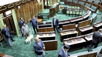 Security personnel checking the House during the budget session of the Jammu and Kashmir assembly, in Jammu, on Saturday. (PTI Photo)