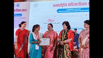 Shivani being felicitated at Bhagidari Bhavan by WCD Minister Baby Rani Maurya, Women’s Commission Vice Chairperson Aparna Yadav, and others. (HT) Shivani being felicitated at Bhagidari Bhavan by WCD Minister Baby Rani Maurya, Women’s Commission Vice Chairperson Aparna Yadav, and others. (HT)
