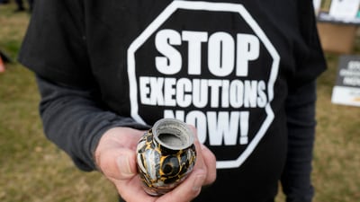 Randy Gardner holds the ashes of his brother Ronnie, the last U.S. death row inmate executed by firing squad, during a protest against Brad Sigmon’s execution in Columbia, SC on March 7, 2025. (AP) Randy Gardner holds the ashes of his brother Ronnie, the last U.S. death row inmate executed by firing squad, during a protest against Brad Sigmon’s execution in Columbia, SC on March 7, 2025. (AP)