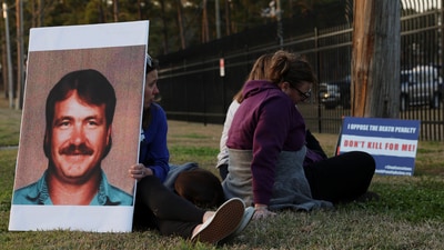Sigmon’s lawyers said he chose the firing squad over electrocution, fearing he would be "cooked alive," and rejected lethal injection due to concerns of fluid rushing into his lungs. On Friday, he wore a black jumpsuit, a hood, and a white target with a red bullseye on his chest. (REUTERS)