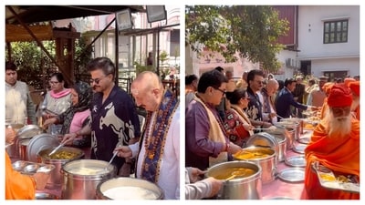 Anupam Kher and Anil Kapoor distributing food among sadhus. Anupam Kher and Anil Kapoor distributing food among sadhus.