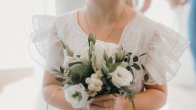 The dress didn't fit the flower girl as the wedding was postponed. (Representational Image/Pexel) The dress didn't fit the flower girl as the wedding was postponed. (Representational Image/Pexel)