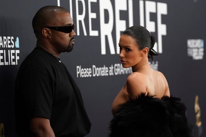 Kanye West and Bianca Censori at the 2025 Grammy Awards turned heads with their bold fashion choices, Bianca stunned in a daring, sheer mini dress that left little to the imagination. (AP) Kanye West and Bianca Censori at the 2025 Grammy Awards turned heads with their bold fashion choices, Bianca stunned in a daring, sheer mini dress that left little to the imagination. (AP)