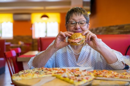 If your grandkids are having junk, doesn't mean you too can take a bite. It's more harmful for you. (Shutterstock)